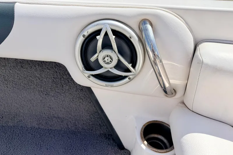 Slide: The Image of 2008 Moomba Outback V boat interior with speaker and stainless steel handle. - 26