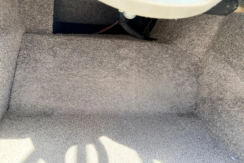 Slide: The Image of Carpeted interior of a 2008 Moomba Outback V boat, showcasing clean and well-maintained flooring. - 47