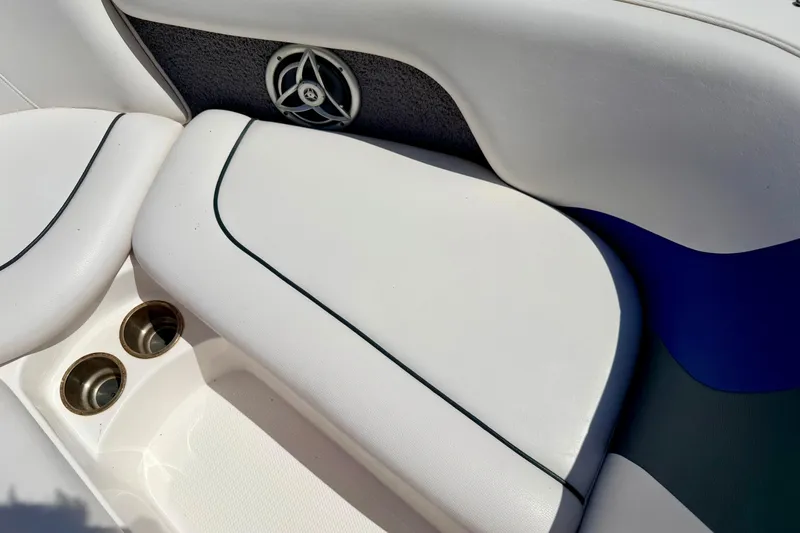 Slide: The Image of 2008 Moomba Outback V boat interior with white seating and cup holders. - 52