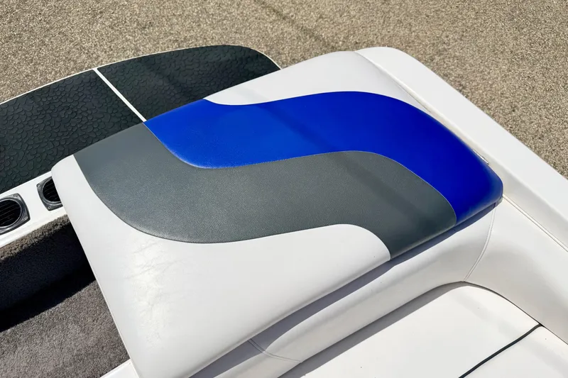Slide: The Image of 2008 Moomba Outback V boat seat with blue, gray, and white upholstery design. - 21