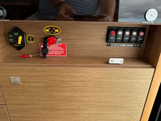Slide: The Image of Interior view of a Jeanneau NC 1095 featuring switches and controls. - 33