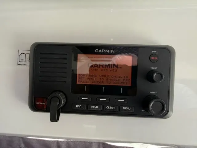 Slide: The Image of Garmin VHF radio on a 2021 Jeanneau NC 1095 boat. - 18