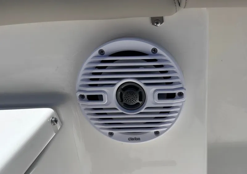 Slide: The Image of Close-up of a white speaker on a boat. - 14