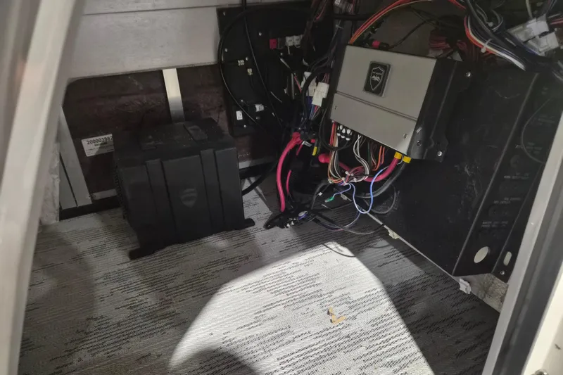 Slide: The Image of Electrical wiring and components inside a 2026 Sylvan L3 ULZ boat compartment. - 22