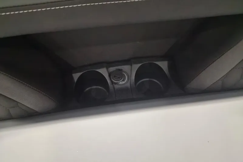 Slide: The Image of Interior cup holders and power outlet in 2026 Sylvan L3 ULZ vehicle. - 7