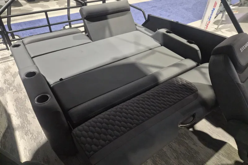 Slide: The Image of 2026 Sylvan L3 ULZ boat interior with gray seating and cup holders. - 12