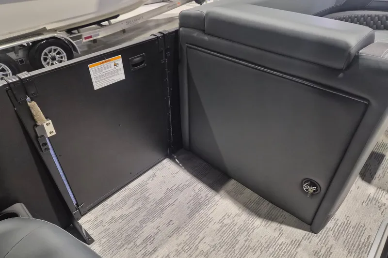 Slide: The Image of Interior view of 2026 Sylvan L3 ULZ boat, showcasing seating and storage area. - 19
