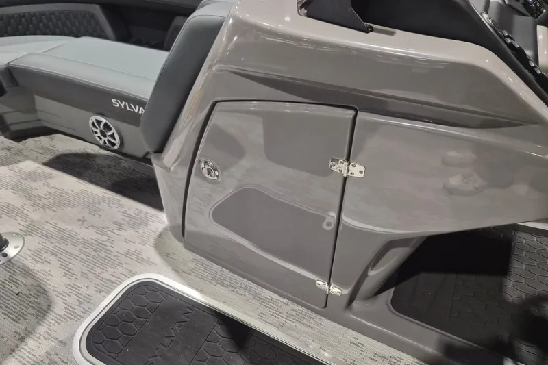 Slide: The Image of 2026 Sylvan L3 ULZ boat interior with sleek gray console and seating. - 21