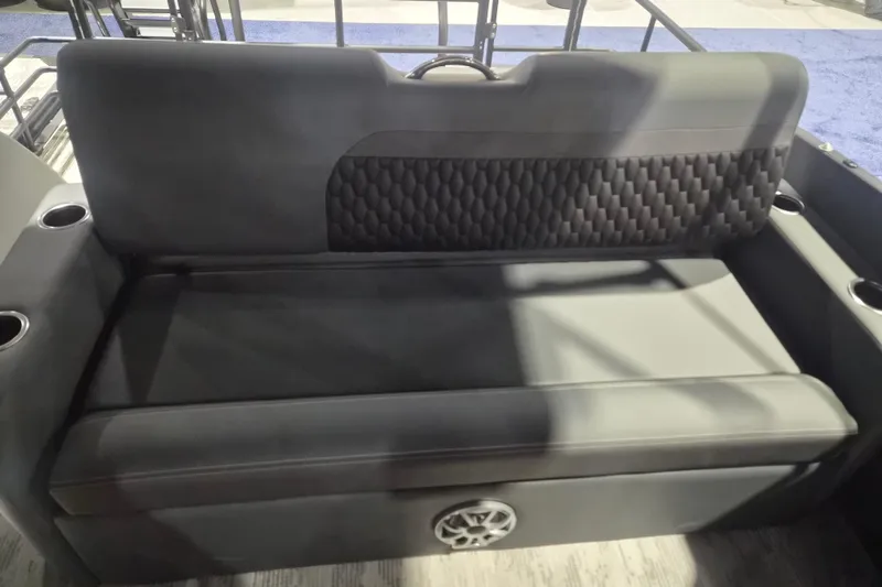 Slide: The Image of Luxurious seating in the 2026 Sylvan L3 ULZ boat, featuring cup holders and stylish upholstery. - 29