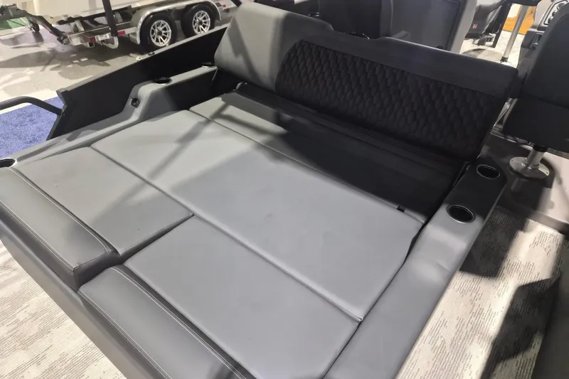 Slide: The Image of Luxurious seating area in the 2026 Sylvan L3 ULZ boat, featuring sleek gray upholstery. - 28