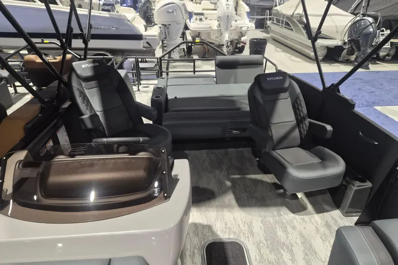 Slide: The Image of Interior of 2026 Sylvan L3 ULZ boat with modern seating and sleek design. - 9