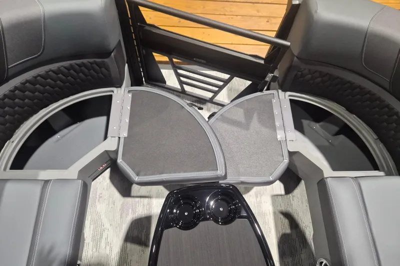 Slide: The Image of Interior view of 2026 Sylvan L3 ULZ boat with seating and storage compartments. - 5