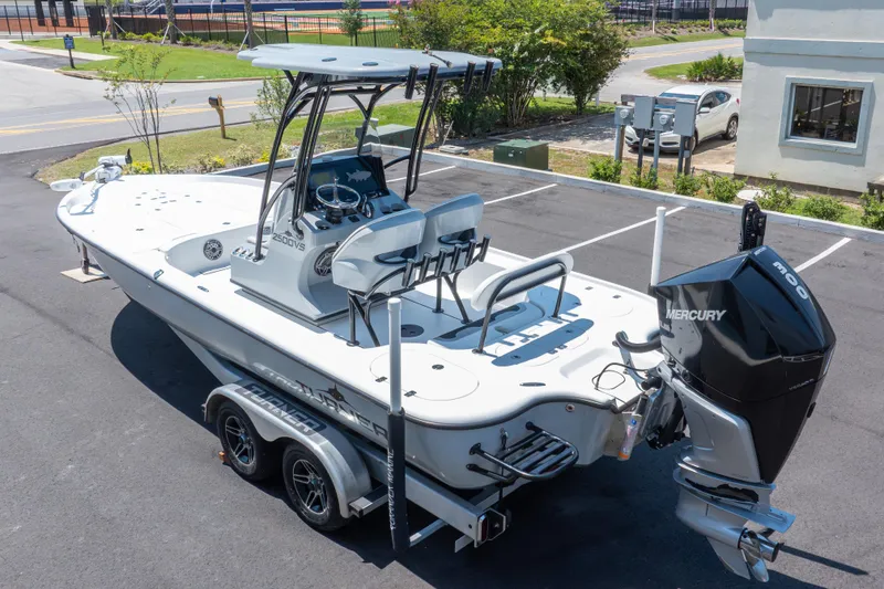 Slide: The Image of 2020 Turner Boatworks 2500 VS with Mercury engine on trailer in parking lot. - 21
