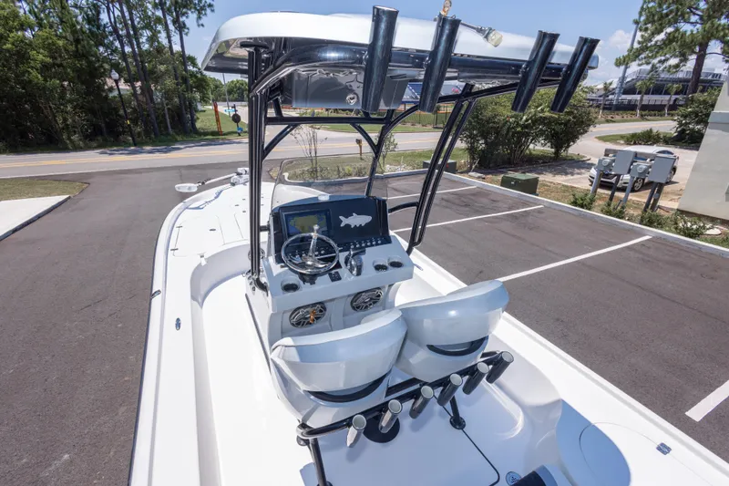 Slide: The Image of 2020 Turner Boatworks 2500 VS center console boat with dual seats and navigation system. - 9