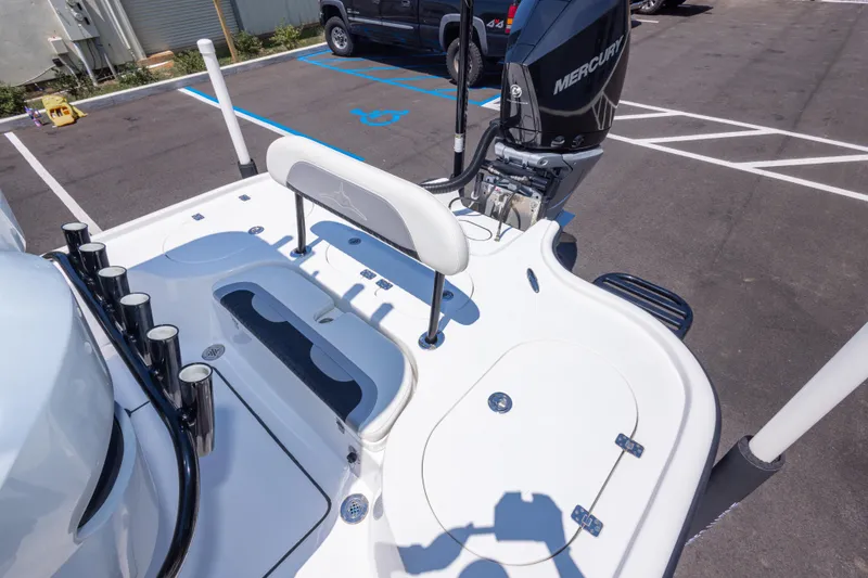 Slide: The Image of 2020 Turner Boatworks 2500 VS with Mercury engine in parking lot. - 18