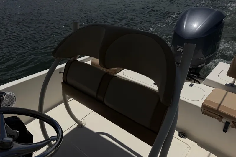 Slide: The Image of 2012 Scout 251 XS boat interior with Yamaha 300 engine on water. - 24