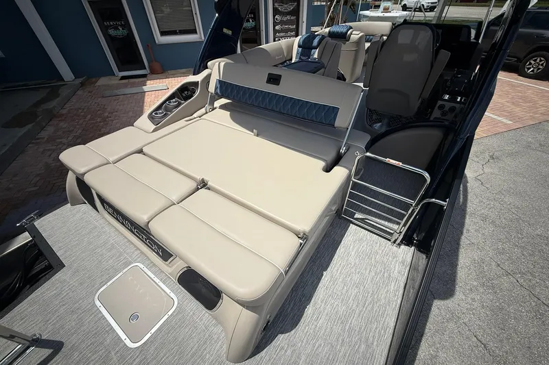 Slide: The Image of 2026 Bennington 27 QSBAT2 pontoon boat with luxurious seating and modern design. - 5