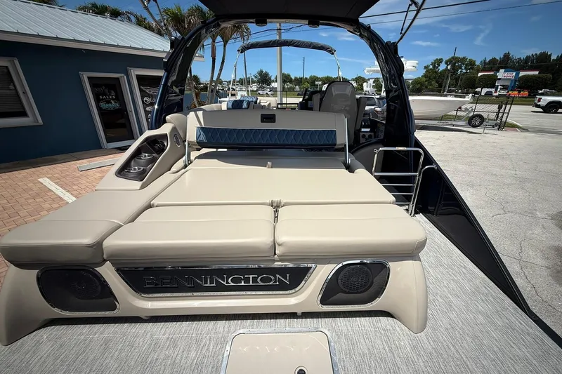 Slide: The Image of 2026 Bennington 27 QSBAT2 luxury pontoon boat with spacious seating and sleek design. - 4