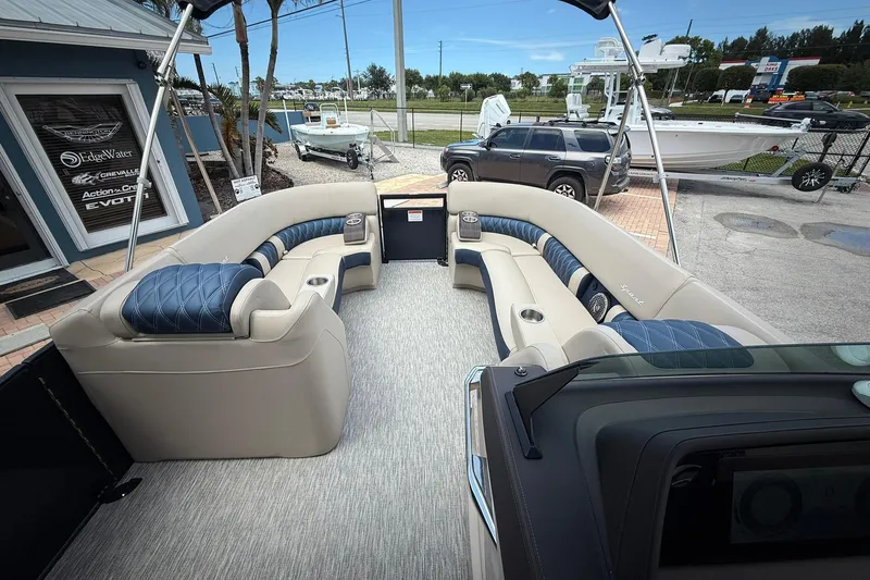 Slide: The Image of Luxurious interior of 2026 Bennington 27 QSBAT2 pontoon boat with plush seating. - 18