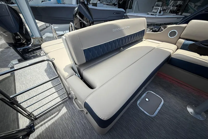 Slide: The Image of 2026 Bennington 27 QSBAT2 boat interior with luxurious seating and modern design. - 8
