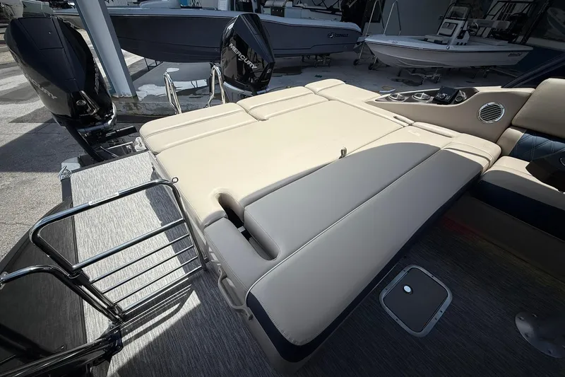 Slide: The Image of 2026 Bennington 27 QSBAT2 boat with luxurious seating and modern design features. - 6