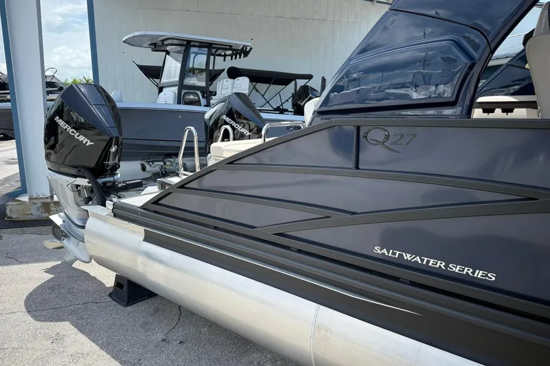 Slide: The Image of 2026 Bennington 27 QSBAT2 Saltwater Series boat with Mercury outboard engines. - 1