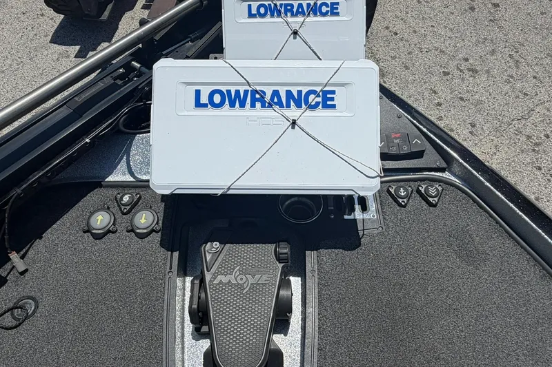 Slide: The Image of 2023 Ranger Z521R boat dashboard with Lowrance electronics and foot pedal controls. - 4