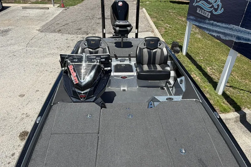 Slide: The Image of 2023 Ranger Z521R boat with dual seats and advanced navigation equipment. - 7