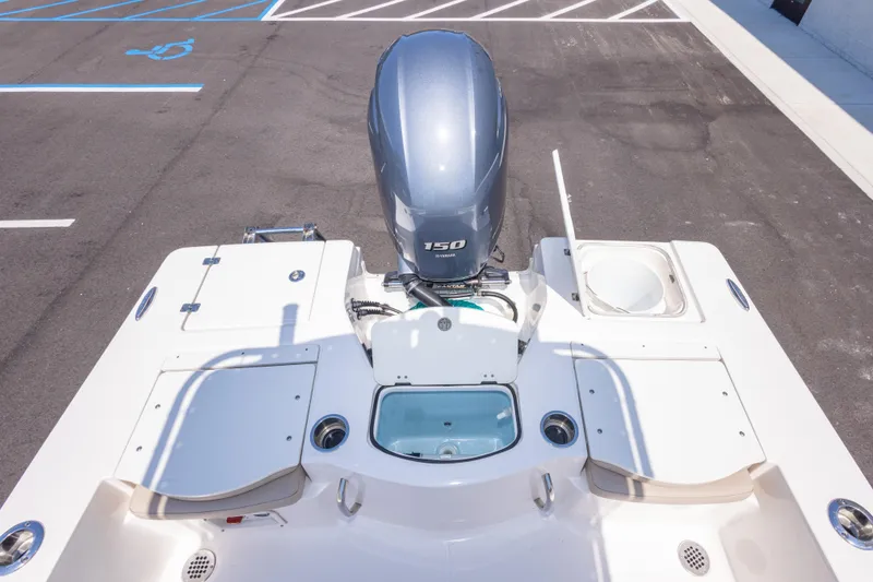 Slide: The Image of 2023 Robalo 206 Cayman boat with Yamaha 150 engine, viewed from above. - 32