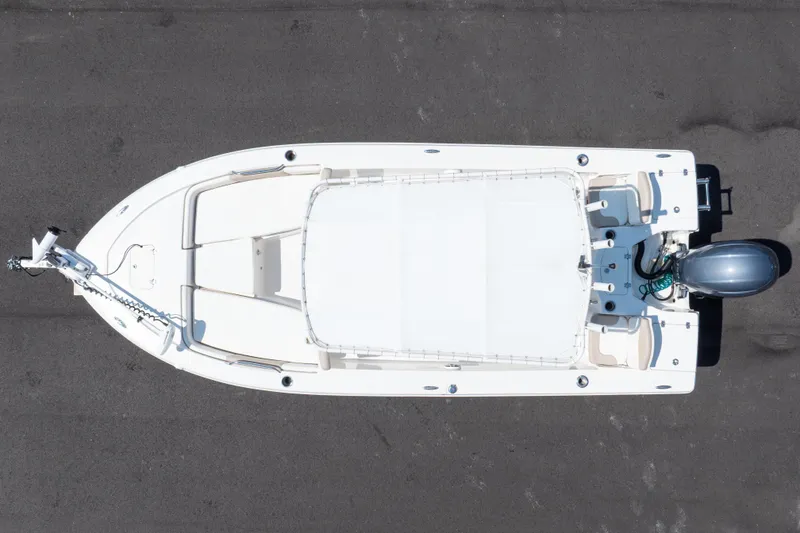 Slide: The Image of Overhead view of 2023 Robalo 206 Cayman boat on pavement. - 41