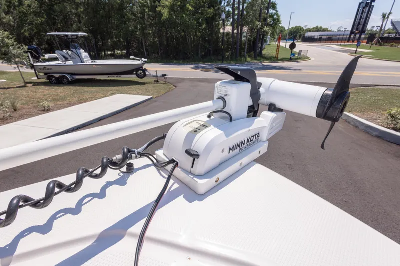 Slide: The Image of 2023 Robalo 206 Cayman with Minn Kota PowerDrive trolling motor on a trailer. - 24