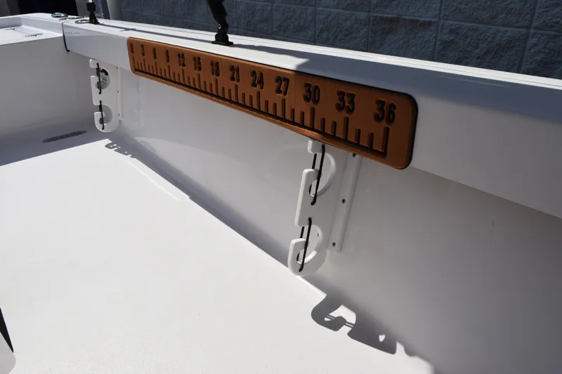 Slide: The Image of 2019 Sportsman Masters 207 Bay Boat with built-in measuring ruler on deck. - 12