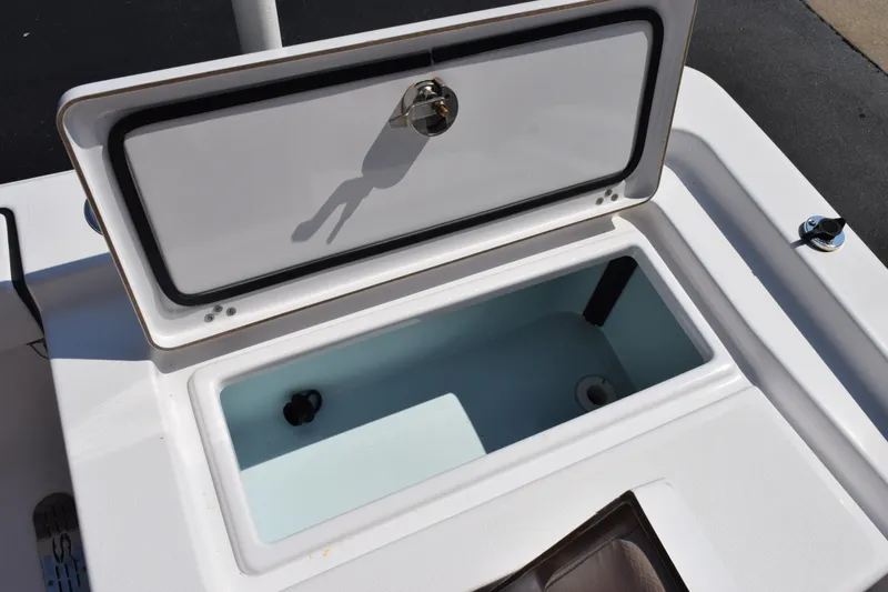 Slide: The Image of Open storage compartment on 2019 Sportsman Masters 207 Bay Boat, showcasing interior space. - 20