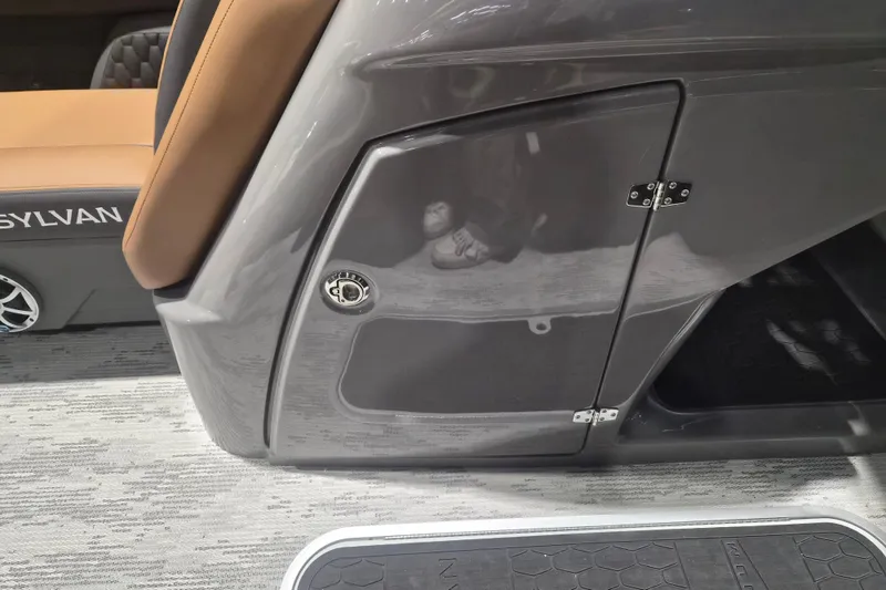 Slide: The Image of 2026 Sylvan L3 SLZ boat interior with sleek gray panel and tan seating. - 7