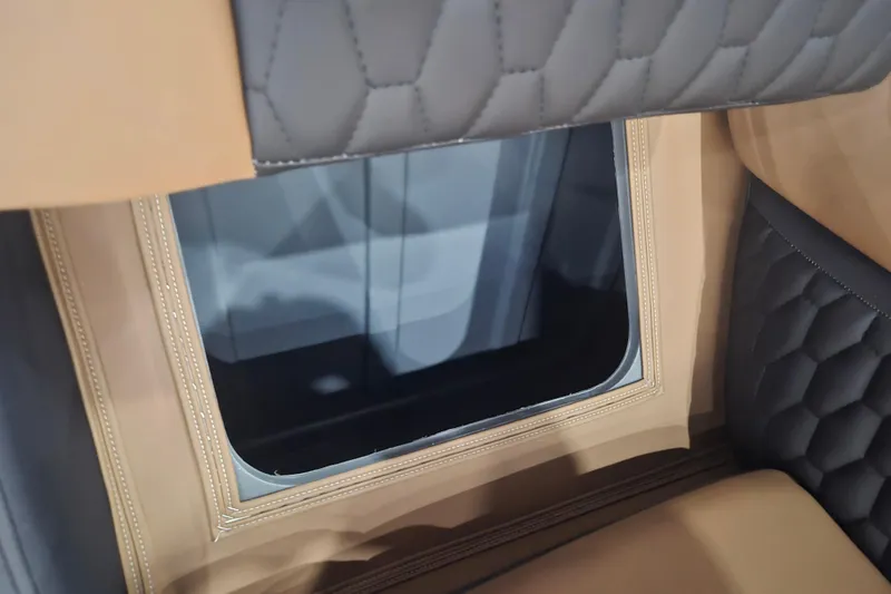 Slide: The Image of Luxurious interior detail of 2026 Sylvan L3 SLZ with quilted leather upholstery. - 20