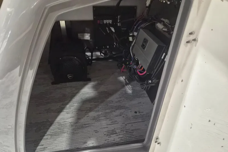 Slide: The Image of Interior view of 2026 Sylvan L3 SLZ boat showing electrical components and wiring. - 8