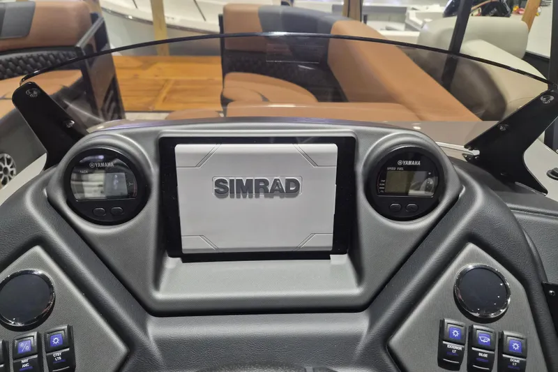 Slide: The Image of Dashboard of 2026 Sylvan L3 SLZ boat with Simrad and Yamaha displays. - 15