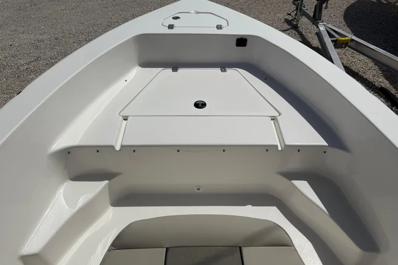 Slide: The Image of 2026 Key West 179 FS boat interior, featuring a sleek, white deck design. - 19