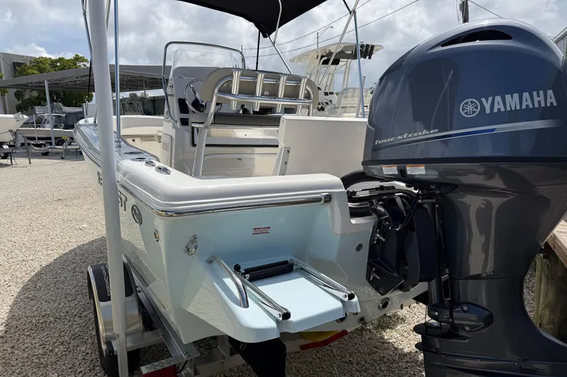 Slide: The Image of 2026 Key West 179 FS boat with Yamaha outboard motor, displayed outdoors. - 6