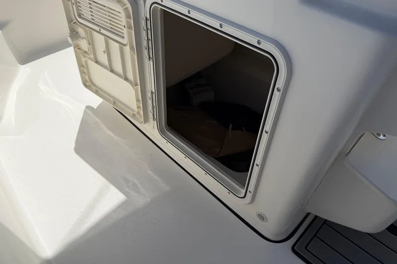 Slide: The Image of Open storage compartment on 2026 Key West 179 FS boat, showcasing interior space. - 25