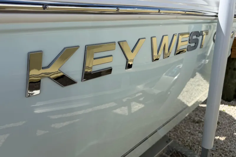 Slide: The Image of 2026 Key West 179 FS boat with reflective logo on the side. - 30