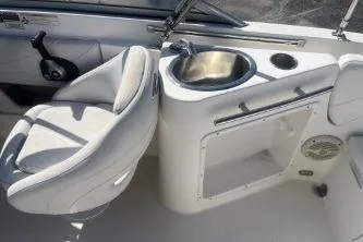 Slide: The Image of 2008 Maxum 2100 SC3 boat interior with seat and sink. - 12