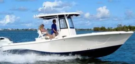 The Image of A modern motorboat on the water with two people on board. - 0