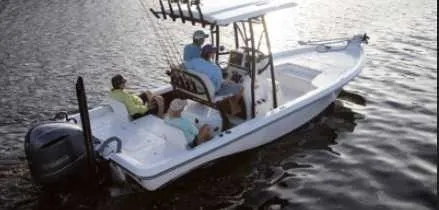 The Image of A 2026 Blazer PureBay 2400 boat on the water with several people on board. - 0