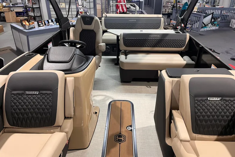 Slide: The Image of Luxurious interior of 2026 Harris Sunliner 250 pontoon boat with plush seating and modern design. - 7