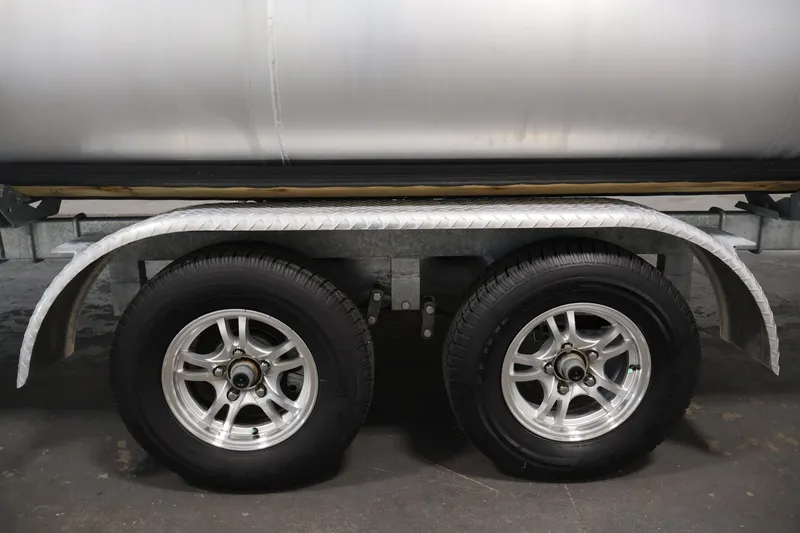 Slide: The Image of Trailer wheels of a 2023 Bennington SV 22 Quad Bench pontoon boat. - 42