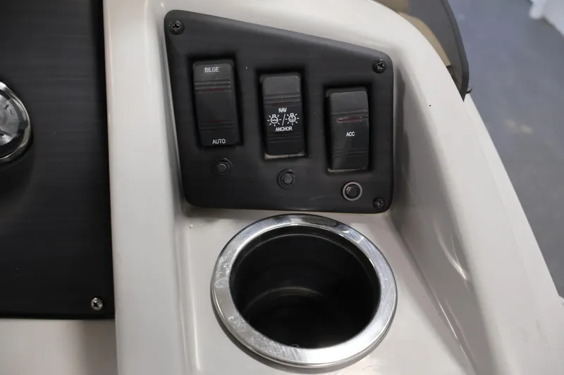 Slide: The Image of Control panel and cup holder on 2023 Bennington SV 22 Quad Bench boat. - 22