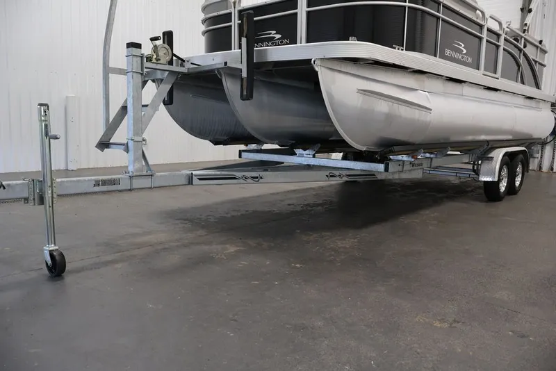 Slide: The Image of 2023 Bennington SV 22 Quad Bench pontoon boat on trailer in a garage. - 33