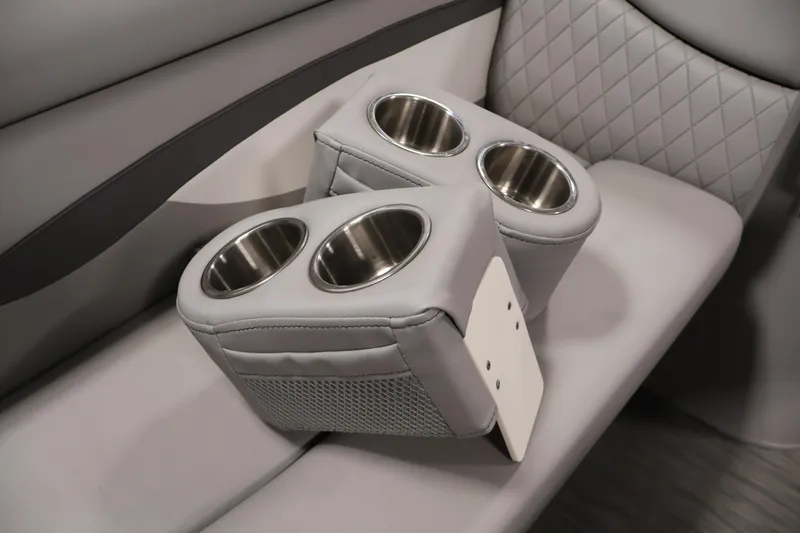 Slide: The Image of Bennington SV 22 Quad Bench 2023 with dual cup holders on luxurious seating. - 15