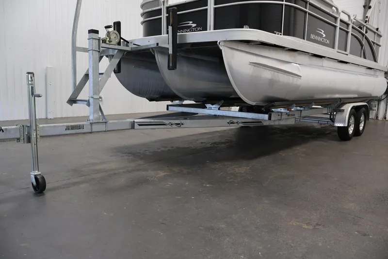 Slide: The Image of 2023 Bennington SV 22 Quad Bench pontoon boat on trailer in a garage. - 41